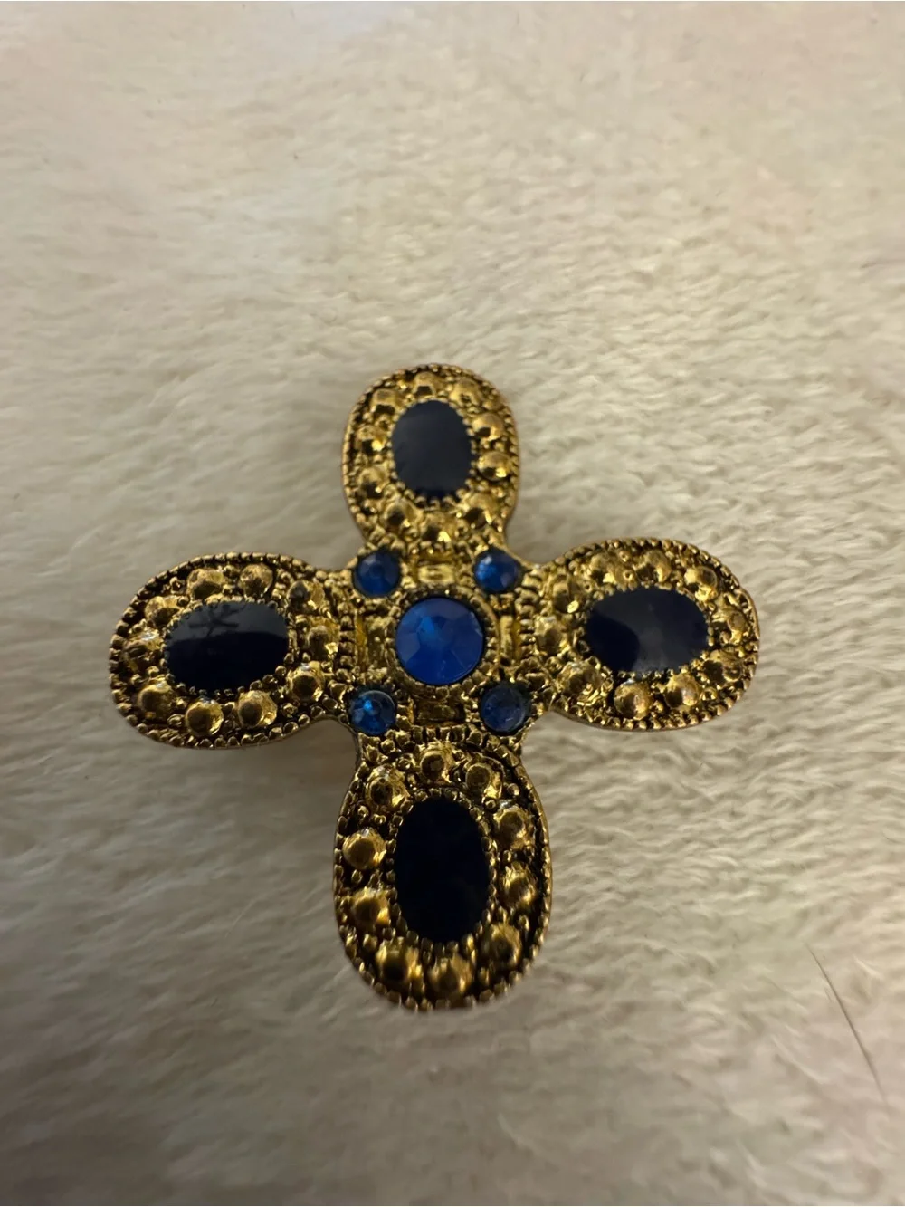 Gold-Tone Cross Brooch with Royal Blue Stones